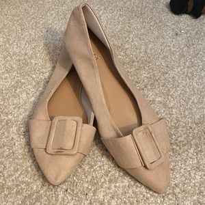 Pointed toe slip ons